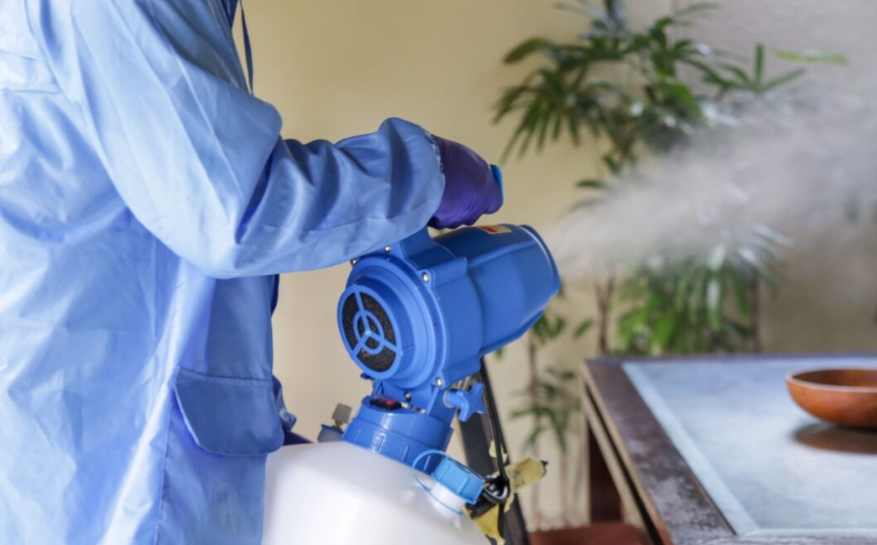 BCS technician performing bio fogging disinfection with a professional fogging machine